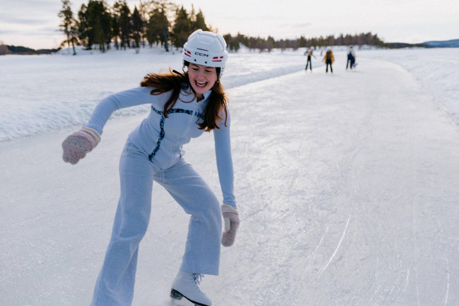 Ice skating on frozen Inarijärvi in Finnish Lapland.